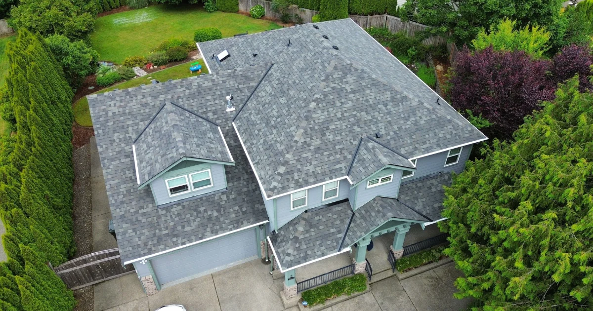 The Costly Reality of PNW Weather: How Rain, Moss, and Moisture Quietly Destroy Your Roof